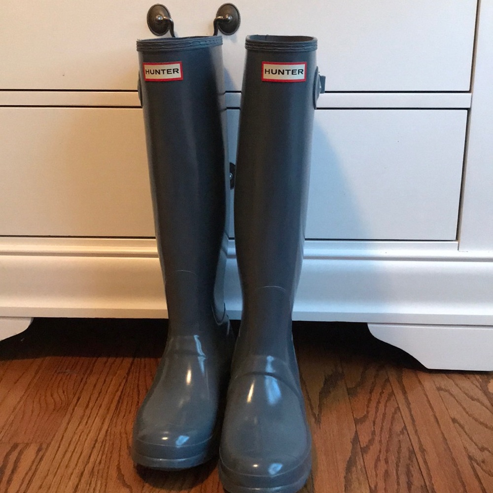 Tall glossy hunter boots